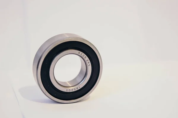 Chrome ball bearing on white background — Stock Photo, Image