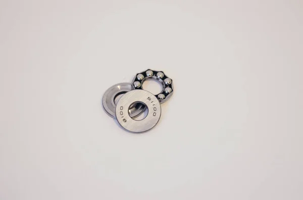 Chrome ball bearings on white background — Stock Photo, Image