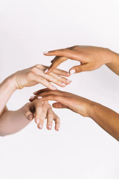 Multirassische Hände Halten Auf Weißem Hintergrund — Stockfoto