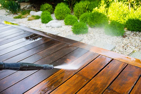 Cleaning terrace with a power washer — Stock Photo, Image