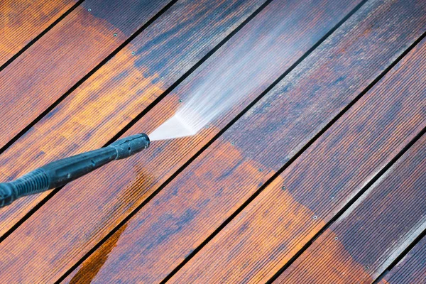 Cleaning terrace with a power washer — Stock Photo, Image