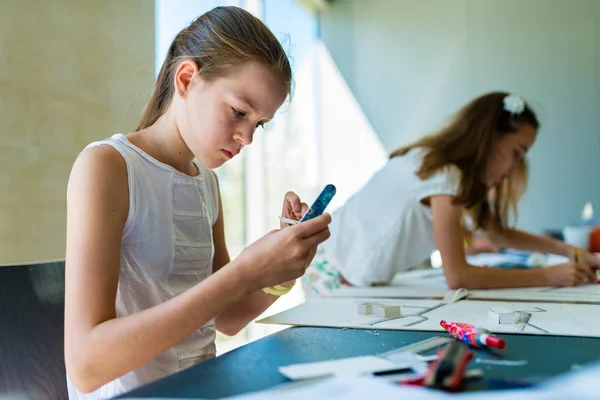 Young girl on the course of architectural design for children — Stock Photo, Image