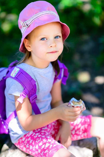 Girl eating chocolate wafers - chocolate bar — Stock Photo, Image