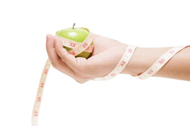 yeşil elma bağlama teyp yandan ölçme ile beyaz zemin üzerine, diyet kavramı izole