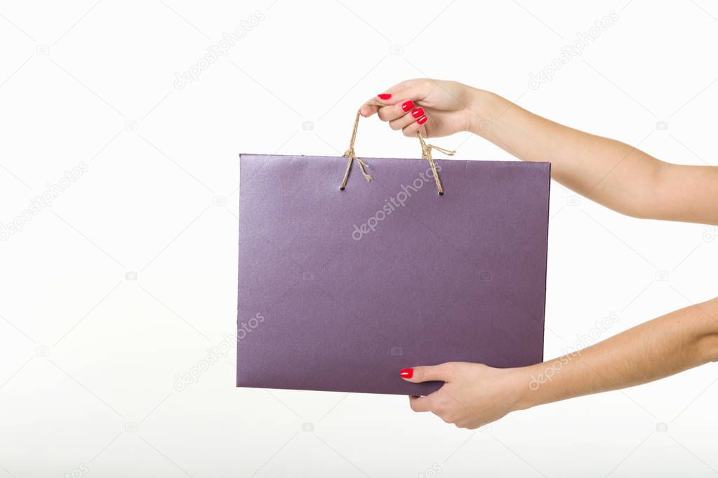 girl with shopping bags on a white background