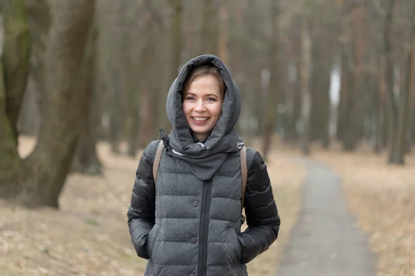 Portrait of a girl in a gray jacket in the open air — Stock Photo, Image