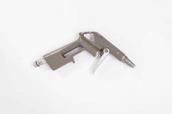 Zámečnické nástroje pneumatické pistole na bílém pozadí. Izolovat — Stock fotografie