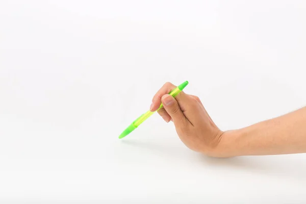 Mãos femininas sobre um fundo branco com uma caneta — Fotografia de Stock