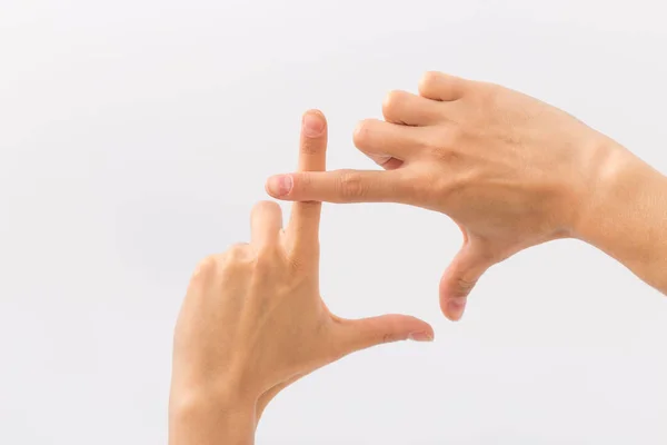 Manos femeninas sobre fondo blanco. Gestos — Foto de Stock