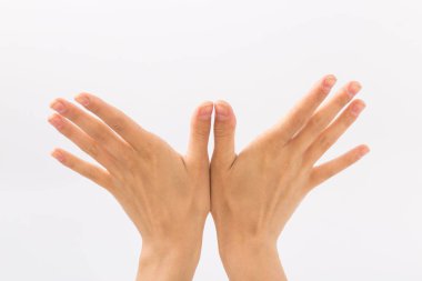 Beyaz bir arka plan üzerinde eller. Hareketleri