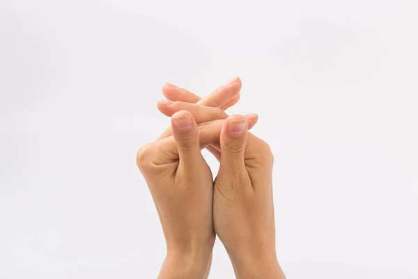 Mãos femininas sobre um fundo branco. Gestos — Fotografia de Stock