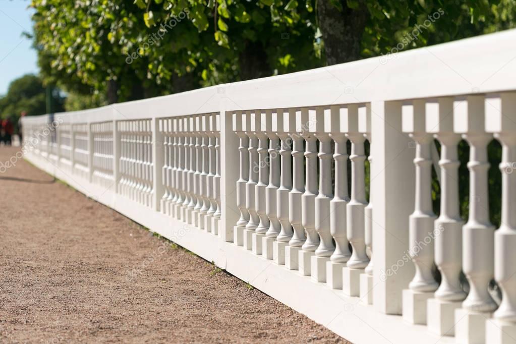 Beautiful white railing against the sea and sky background