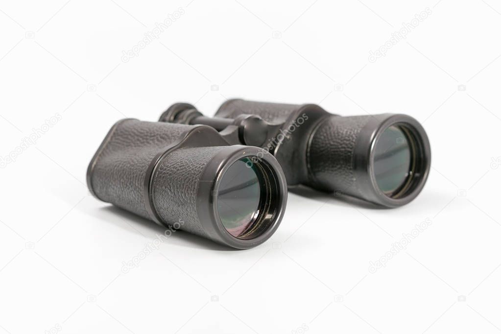 binoculars with large magnification on a monophonic background.