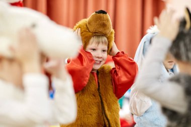 Gomel, Belarus - DECEMBER 20, 2017: New Year's holiday for children in kindergarten. Children 4 - 5 years. clipart