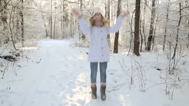 Beautiful Girl Pink Hat Mittens Winter Snowy Forest — Stock Video