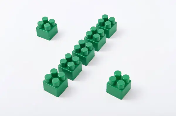 Figures from a colored cubes designer on a white background — Stock Photo, Image