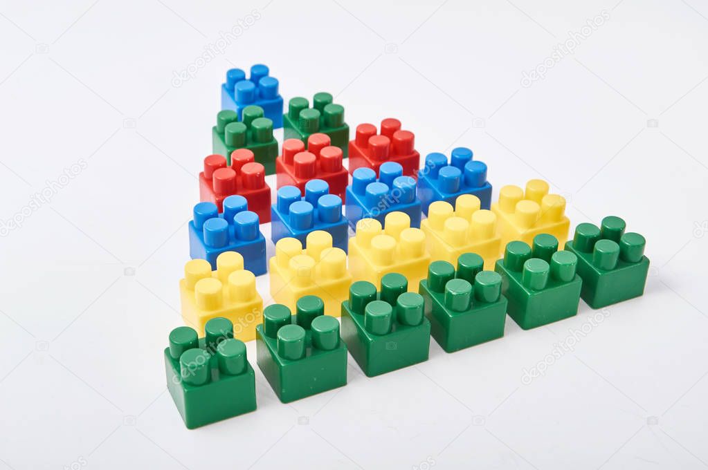 Colorful cubes of designer on white background.