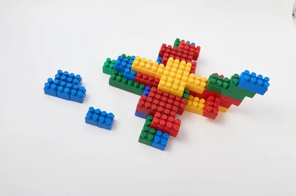 Figures from a colored cubes designer on a white background — Stock Photo, Image