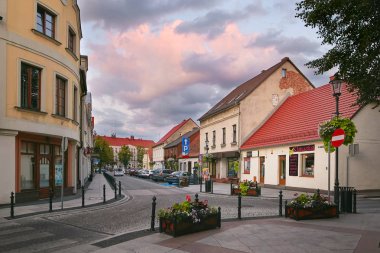 Wolsztyn, POLAND - 27 August 2017: Buildings along Kocielna Street. clipart