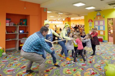GOMEL, BELARUS - 18 April 2018: Children play in the children's entertainment center. children's playroom. clipart