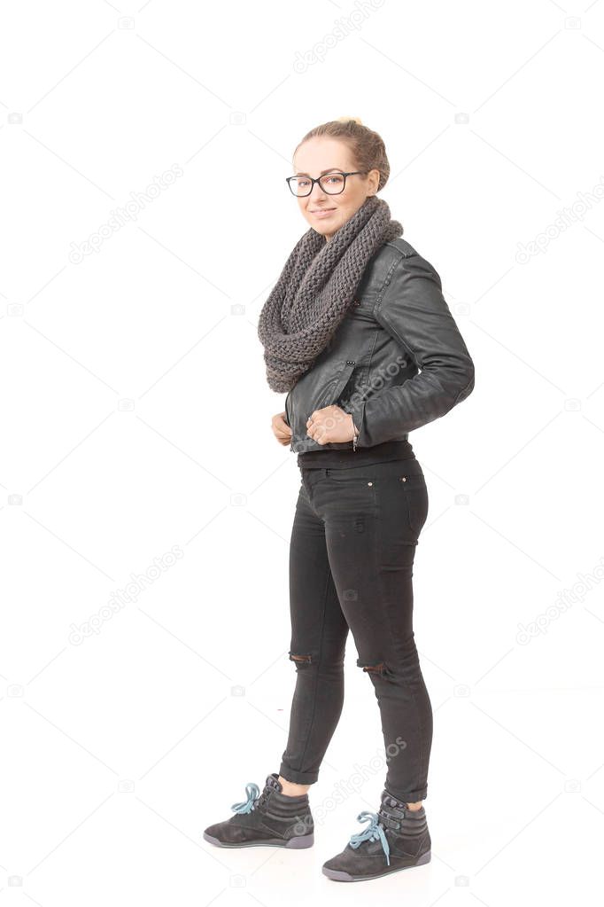 A girl in a demi-season clothes In a snob on a white background.
