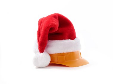 Beyaz arka planda Noel Baba şapkalı inşaat başlığı.