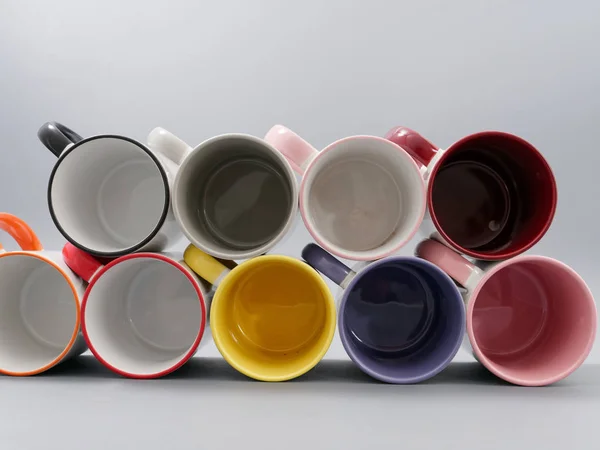 Colored cups for sublimation in composition on a gray background — 스톡 사진