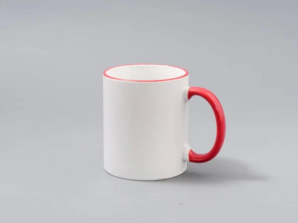 Colored cups for sublimation in composition on a gray background — 스톡 사진