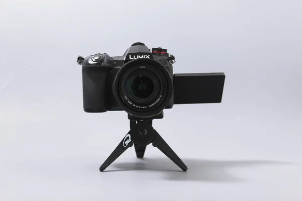 Gomel, Belarus - February 18, 2020: Lumix camera on a mini tripod — Stock Photo, Image