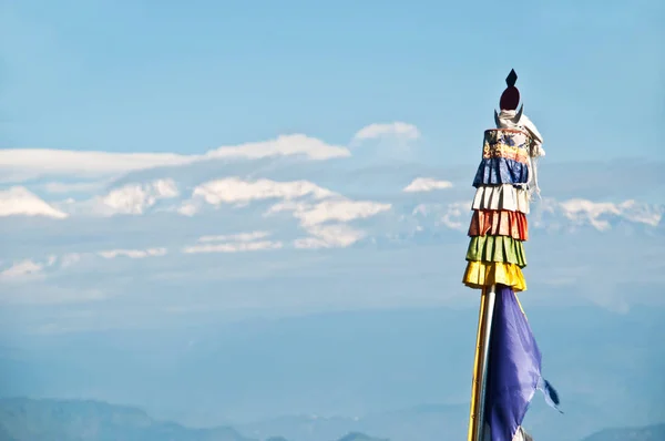 Tibetan prayer flags pyllons  at a blue sky — Stock Photo, Image