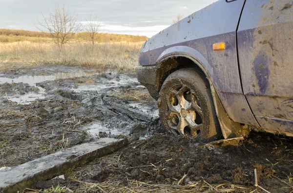 The car got stuck in the mud