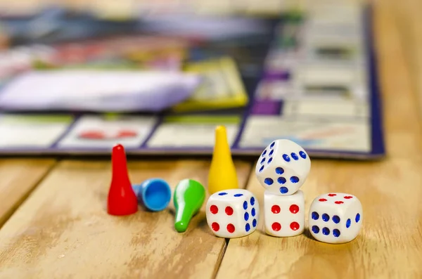 Cubes with the game monopoly on the table