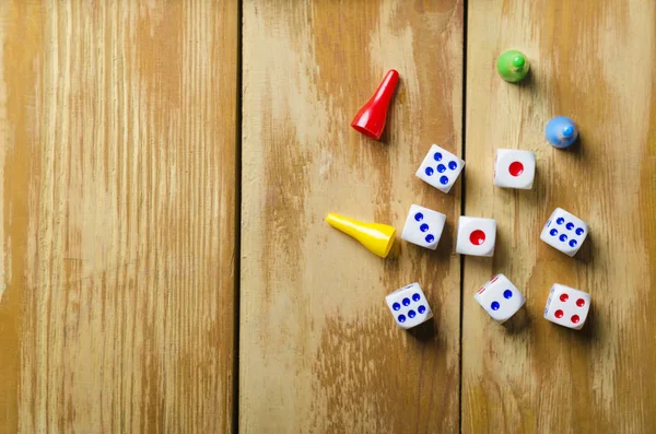 Cubes with the game monopoly on the table