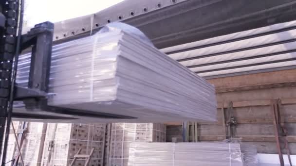 Manufacture of upholstered furniture. Warehouse space. Laying plywood sheets in stock — Stock Video