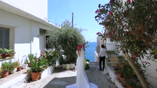 Beautiful newlyweds. greece. tenderness of feelings. — Stock Video