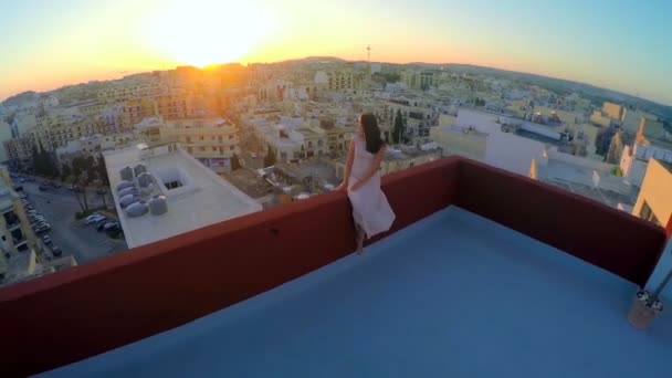 Woman Sitting Roof House City Background Malta — Stock Video