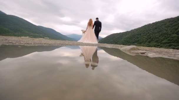 Happy Newlyweds Cuddling River Mountains Georgia — Stock Video