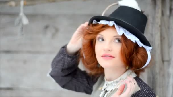 Beautiful red-haired girl posing with hand-made rat — Stock Video