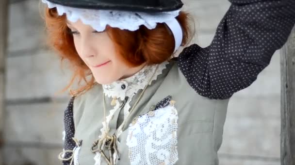 Beautiful red-haired girl posing with hand-made rat — Stock Video
