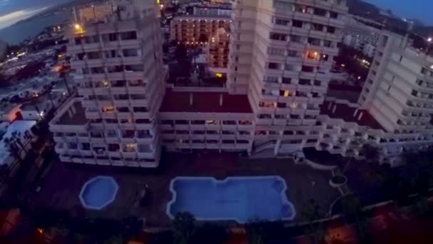 Night over the coastal hotels of the Atlantic Ocean. Aerial view. Tenerife — Stock Video