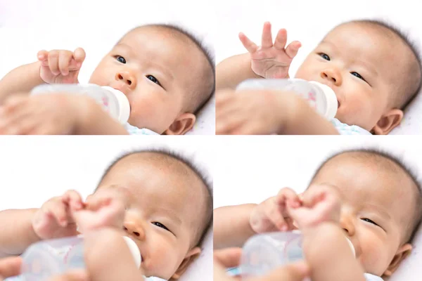 Усміхаючись азіатських немовляти немовляти насолоджуватися питної води з пляшки — стокове фото