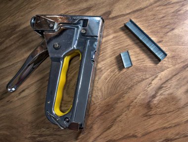 construction stapler at work home repair clipart