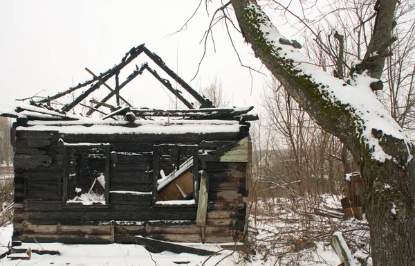 burnt wooden house after a fire