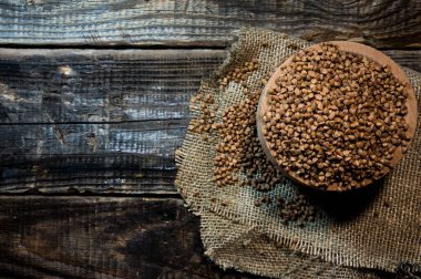 buckwheat in a wooden bowl on the table