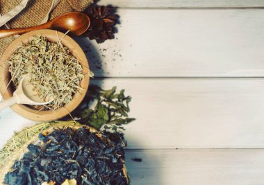 set of healing herbs traditional medicine on a white table with a place for an inscription