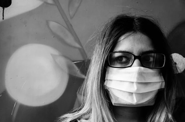 Protection against infectious diseases, coronaviruses. girl wearing a hygiene mask to prevent infections, respiratory diseases such as flu and COVID-19