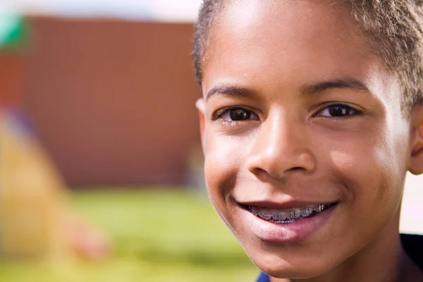 Happy African American boy with open arms. — Stock Photo, Image