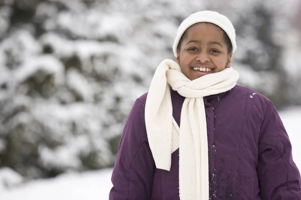 African American young girl smiling in the snow. — Stock Photo, Image