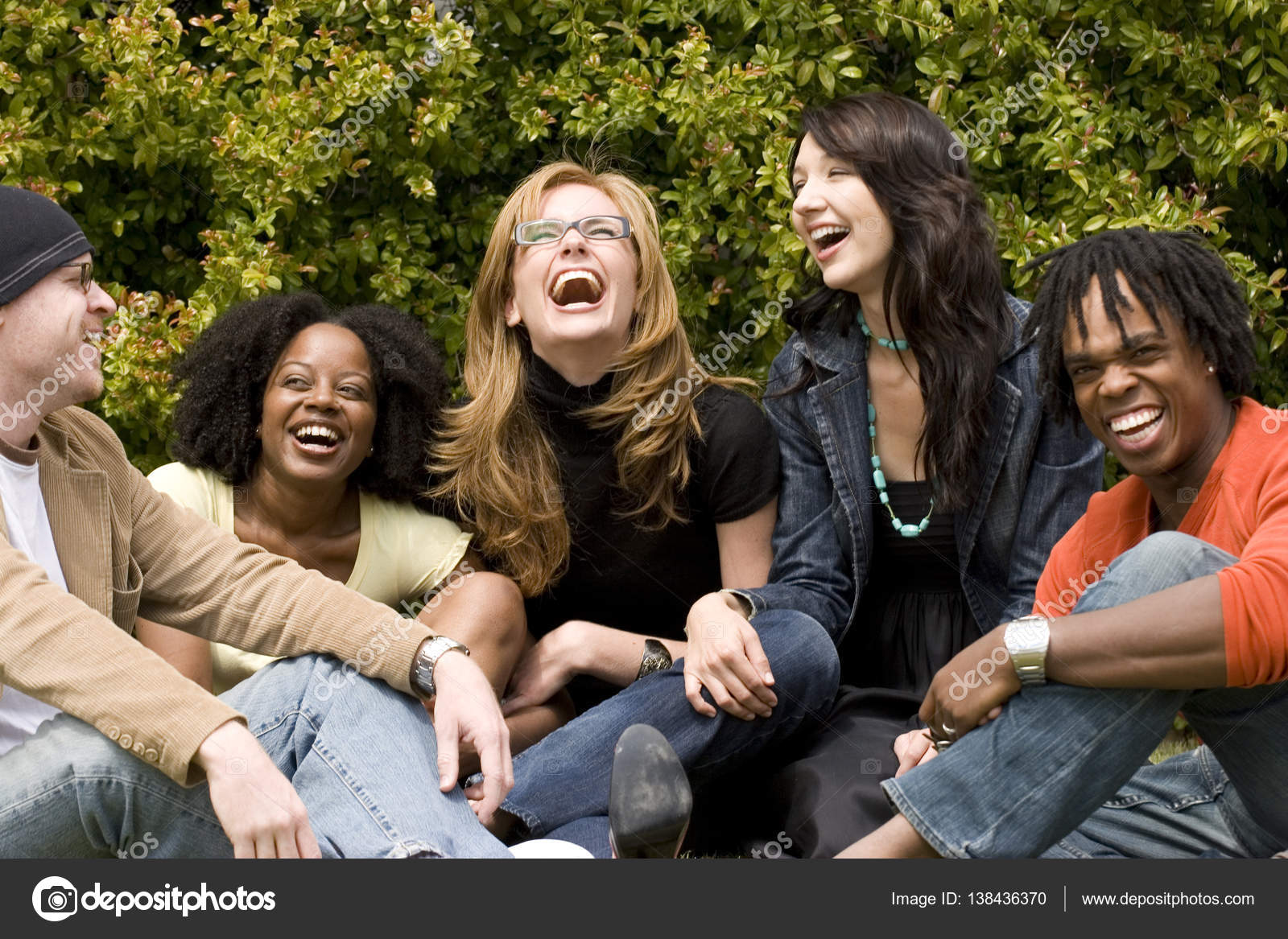 Diverse group of people talking and laughing Stock Photo