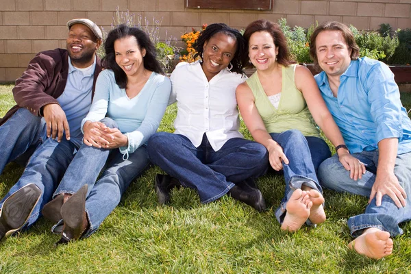 Diverse group of friends hanging out and talking. — Stock Photo, Image